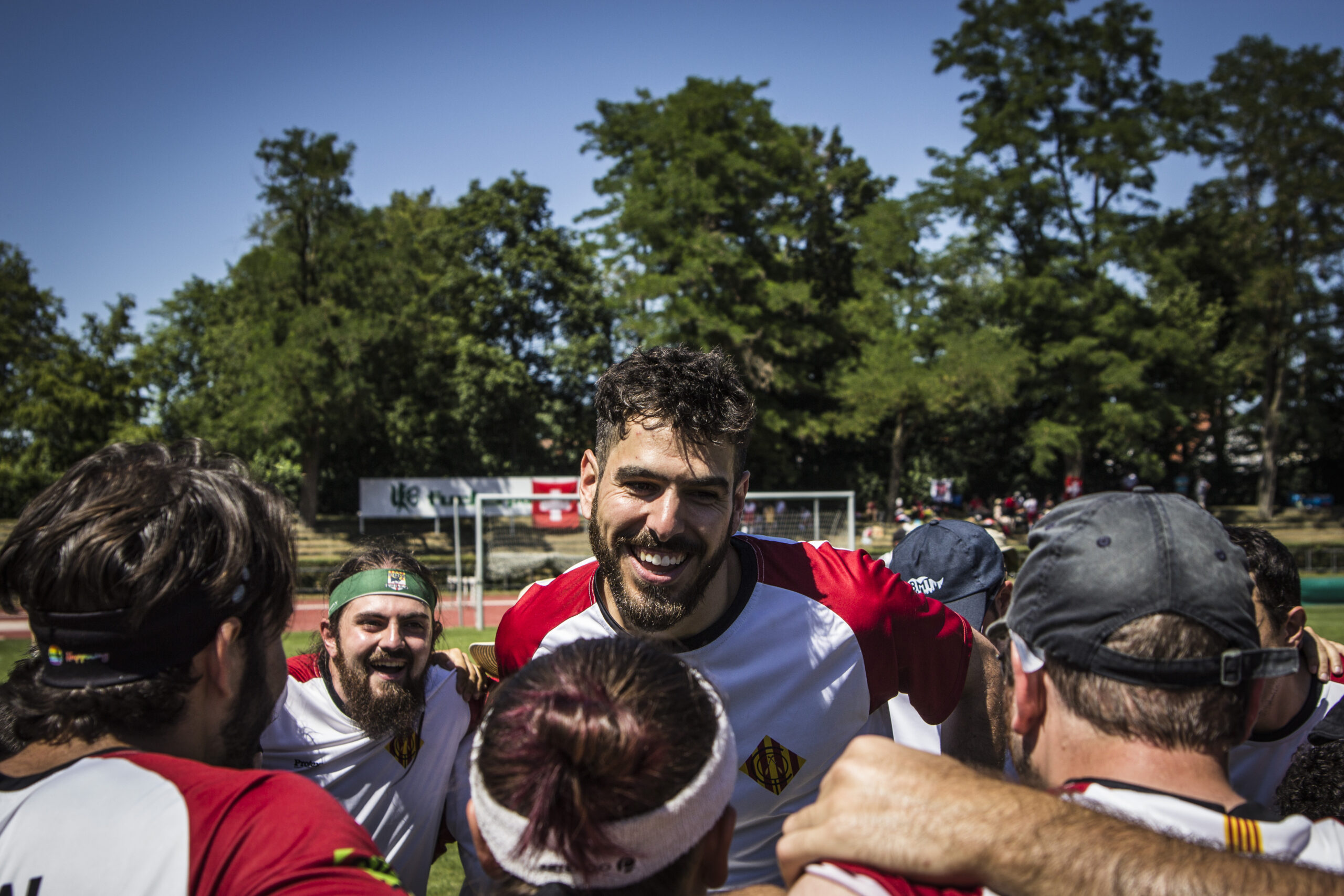 Quadball player smiling in huddle